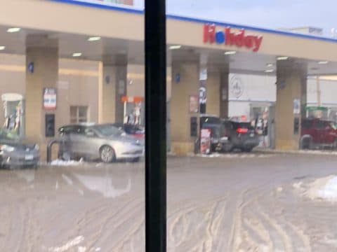 Holiday gas station carjacking